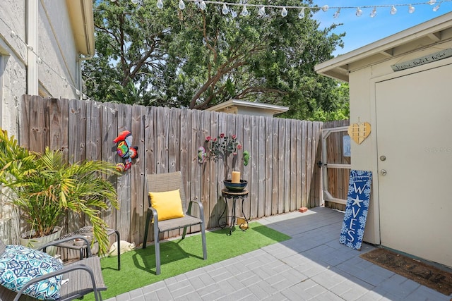 4306 La Mora Ct, Tampa, FL 33611 - view of patio with a fenced backyard