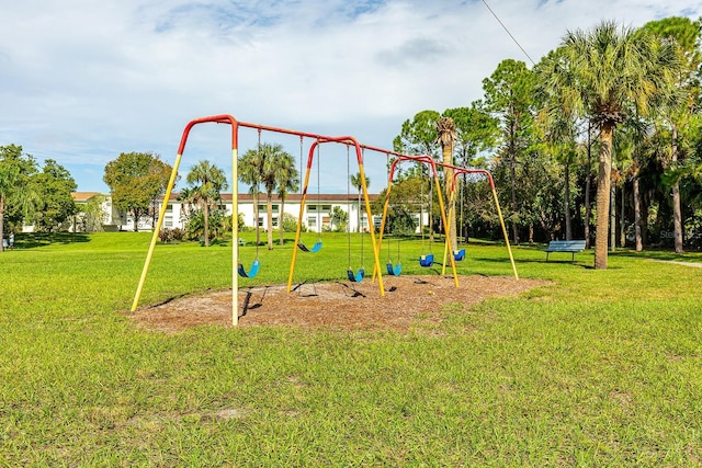 4306 La Mora Ct, Tampa, FL 33611 - communal playground featuring a lawn