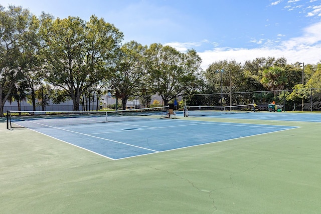 4306 La Mora Ct, Tampa, FL 33611 - view of tennis court with fence and community basketball court