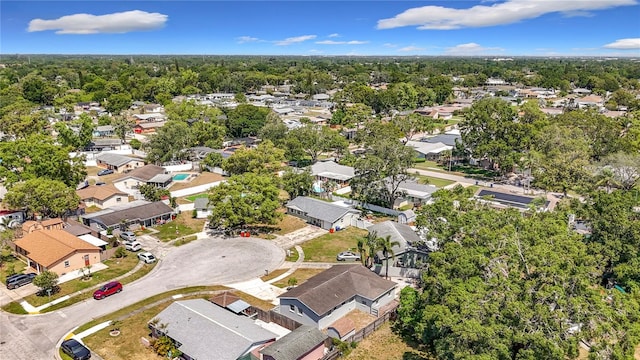 birds eye view of property with a residential view