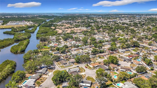 birds eye view of property featuring a residential view and a water view