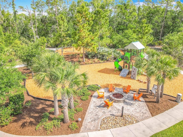 17683 Ramble On Way, Land O Lakes, FL 34638 - view of playground featuring a fire pit and a patio area