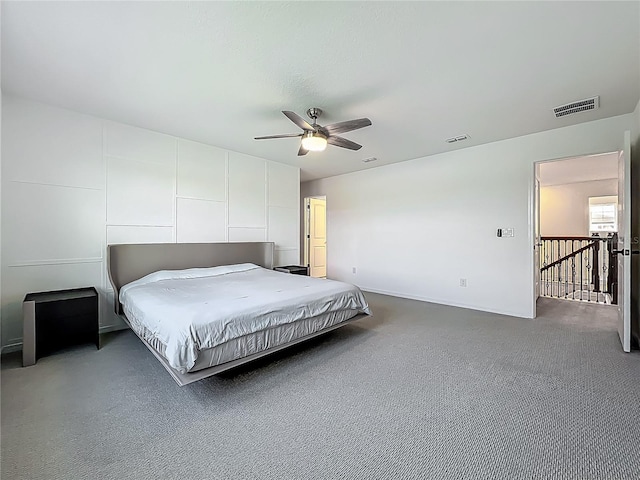 17683 Ramble On Way, Land O Lakes, FL 34638 - carpeted bedroom featuring a ceiling fan, baseboards, and visible vents