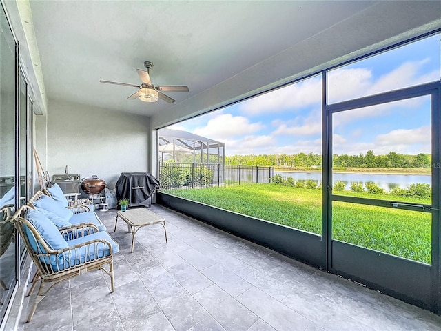 17683 Ramble On Way, Land O Lakes, FL 34638 - sunroom / solarium featuring a water view and ceiling fan