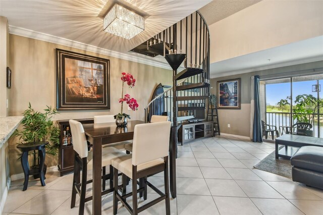 2400 Feather Sound Dr Unit 735, Clearwater, FL 33762 - dining room featuring a chandelier, baseboards, light tile patterned floors, ornamental molding, and stairway