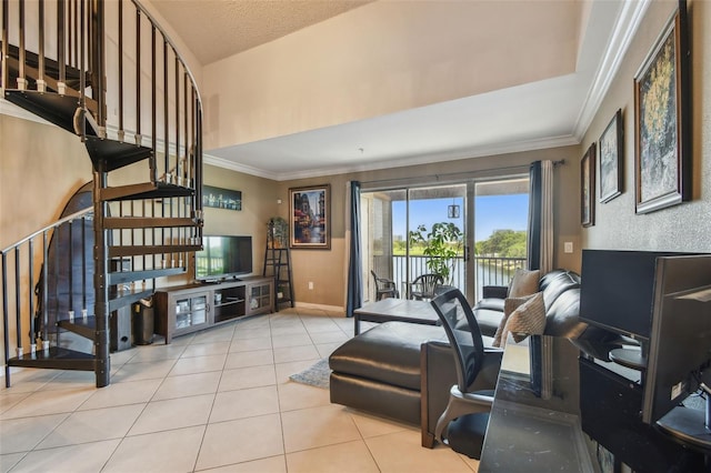 2400 Feather Sound Dr Unit 735, Clearwater, FL 33762 - living room with baseboards, tile patterned flooring, ornamental molding, and stairway