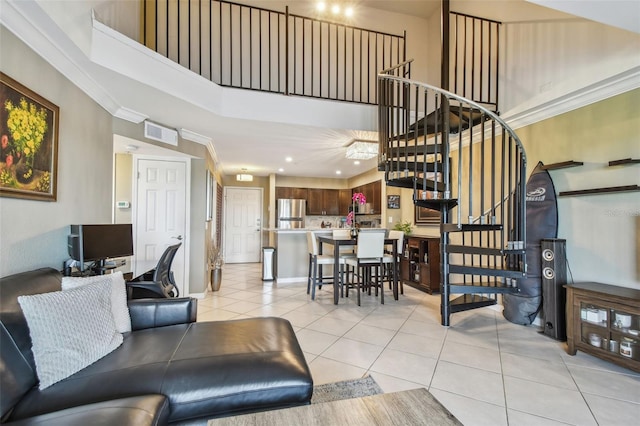 2400 Feather Sound Dr Unit 735, Clearwater, FL 33762 - living room featuring visible vents, stairway, light tile patterned floors, a high ceiling, and recessed lighting