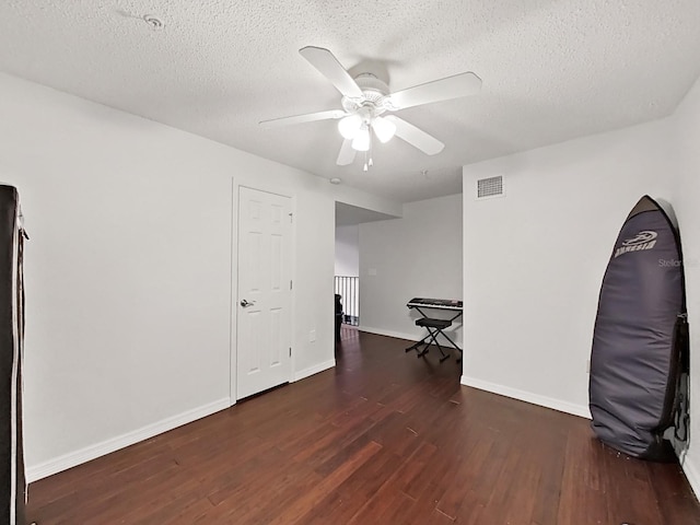 2400 Feather Sound Dr Unit 735, Clearwater, FL 33762 - unfurnished room featuring ceiling fan, a textured ceiling, baseboards, wood finished floors, and visible vents
