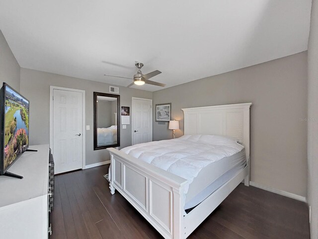 2400 Feather Sound Dr Unit 735, Clearwater, FL 33762 - bedroom featuring baseboards, ceiling fan, dark wood-style floors, and visible vents
