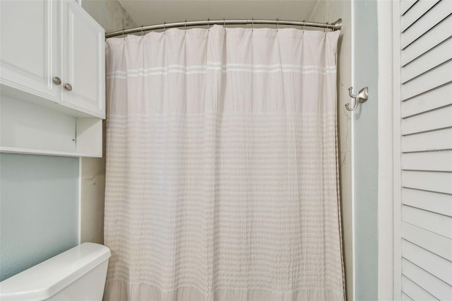 2400 Feather Sound Dr Unit 735, Clearwater, FL 33762 - full bathroom with curtained shower and toilet