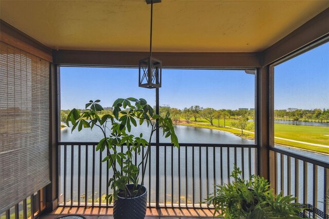 2400 Feather Sound Dr Unit 735, Clearwater, FL 33762 - sunroom with a water view