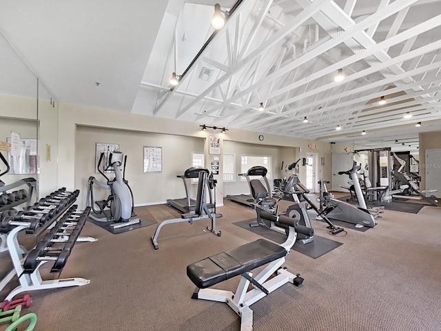 2400 Feather Sound Dr Unit 735, Clearwater, FL 33762 - workout area with baseboards, visible vents, and lofted ceiling