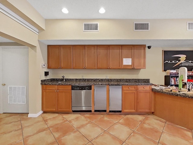 2400 Feather Sound Dr Unit 735, Clearwater, FL 33762 - kitchen with brown cabinets, visible vents, and dishwasher