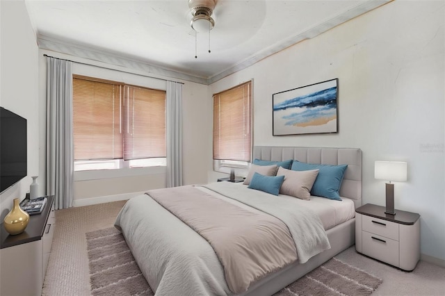 4100 1st Ave S, Saint Petersburg, FL 33711 - bedroom featuring baseboards, light carpet, and a ceiling fan