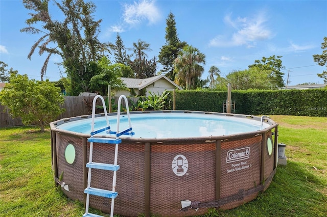 4100 1st Ave S, Saint Petersburg, FL 33711 - view of swimming pool featuring a fenced backyard, a fenced in pool, and a lawn