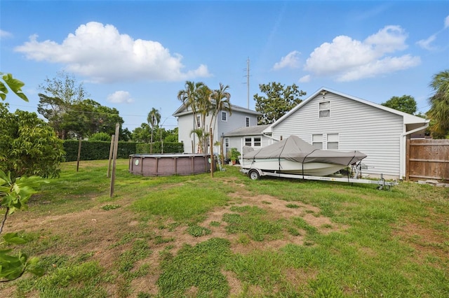 4100 1st Ave S, Saint Petersburg, FL 33711 - view of yard featuring fence and a fenced in pool