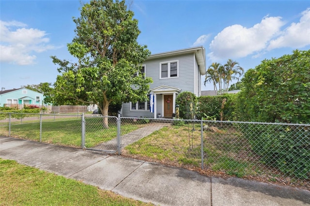 4100 1st Ave S, Saint Petersburg, FL 33711 - view of front of property featuring a fenced front yard and a front yard