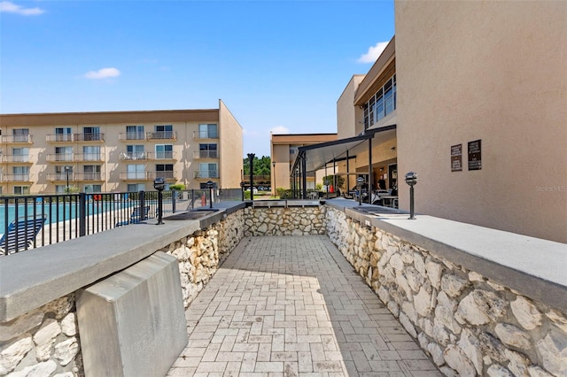 view of patio / terrace with a community pool