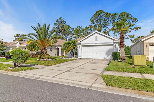 23935 Coral Ridge Ln, Land O Lakes, FL 34639 - ranch-style home with a garage, driveway, a front lawn, and stucco siding