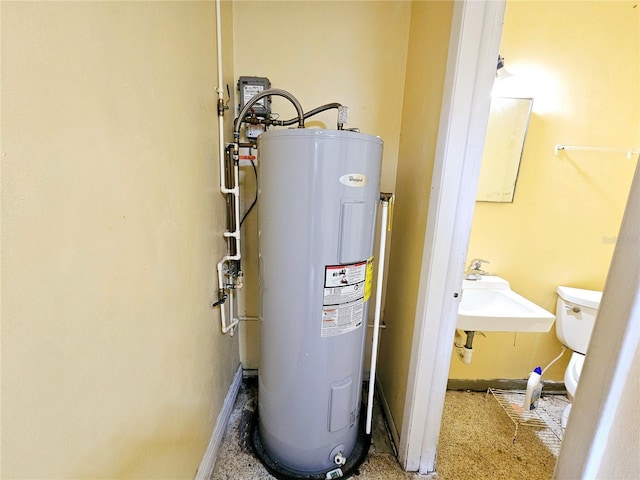 utilities featuring a sink and water heater