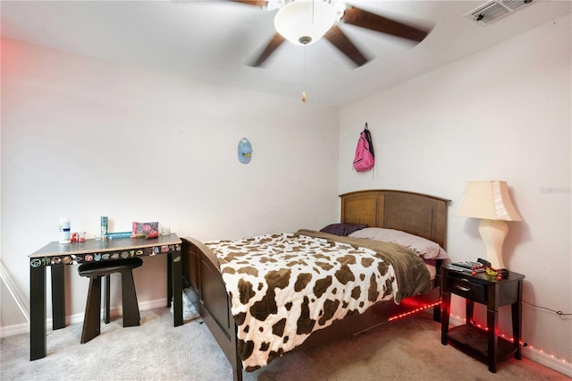 9617 Channing Hill Dr, Ruskin, FL 33573 - bedroom featuring a ceiling fan, visible vents, light carpet, and baseboards