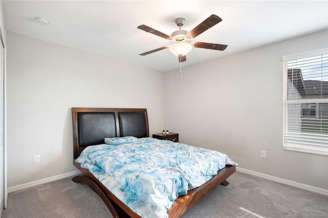 9617 Channing Hill Dr, Ruskin, FL 33573 - bedroom featuring a ceiling fan, carpet flooring, and baseboards