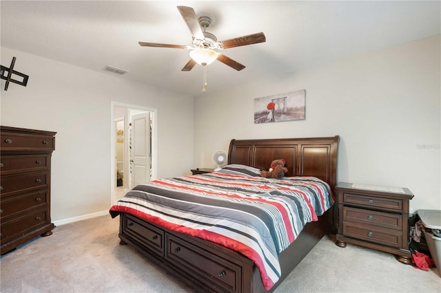 9617 Channing Hill Dr, Ruskin, FL 33573 - bedroom with a ceiling fan, visible vents, light carpet, and baseboards