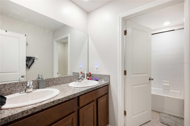 9617 Channing Hill Dr, Ruskin, FL 33573 - bathroom with  shower combination, double vanity, and a sink