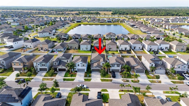 9617 Channing Hill Dr, Ruskin, FL 33573 - aerial view featuring a water view and a residential view
