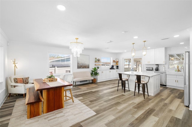 interior space featuring visible vents, recessed lighting, and light wood-type flooring