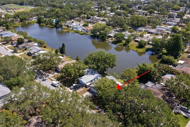 bird's eye view with a residential view and a water view