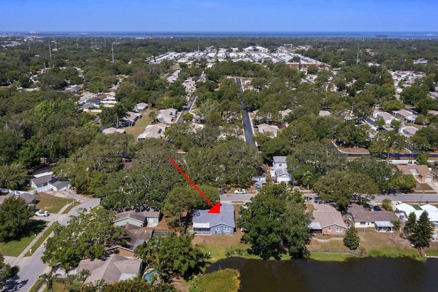 birds eye view of property with a residential view