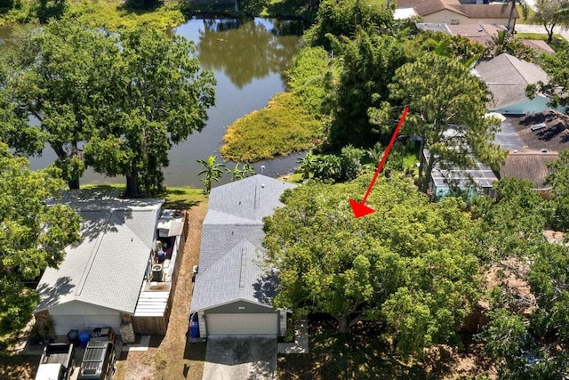 bird's eye view with a water view and a residential view