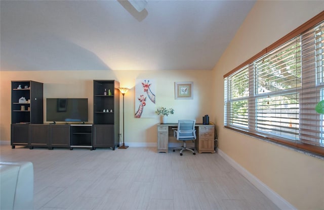 office space featuring baseboards