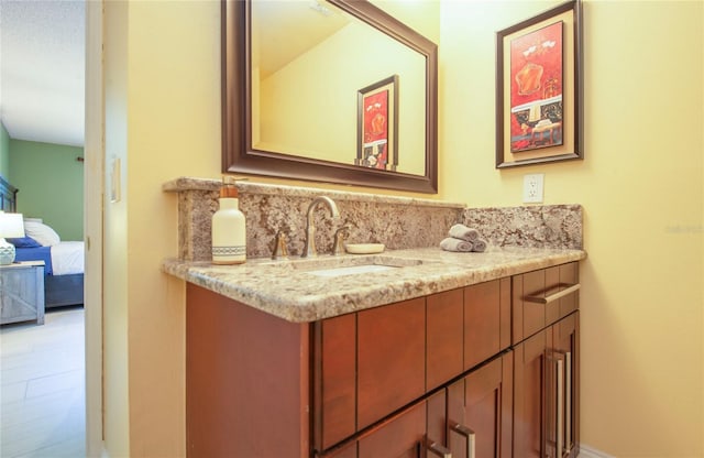 ensuite bathroom with vanity and ensuite bathroom