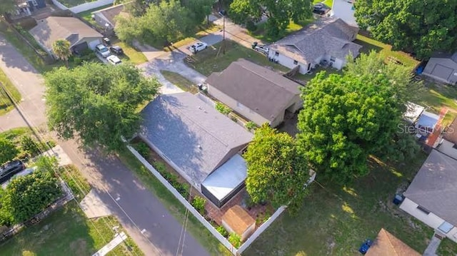 birds eye view of property with a residential view