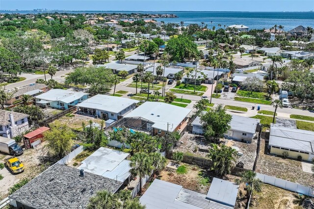 bird's eye view with a water view and a residential view
