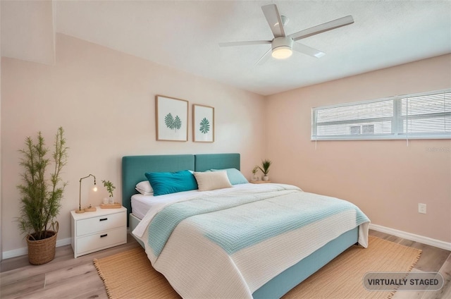 4018 Indianapolis St NE, Saint Petersburg, FL 33703 - bedroom with light wood-type flooring, baseboards, and ceiling fan