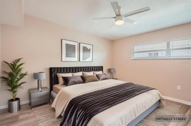 4018 Indianapolis St NE, Saint Petersburg, FL 33703 - bedroom with baseboards, light wood-style flooring, and ceiling fan