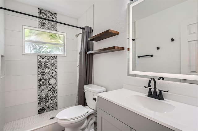 4018 Indianapolis St NE, Saint Petersburg, FL 33703 - full bath with vanity, toilet, and a stall shower
