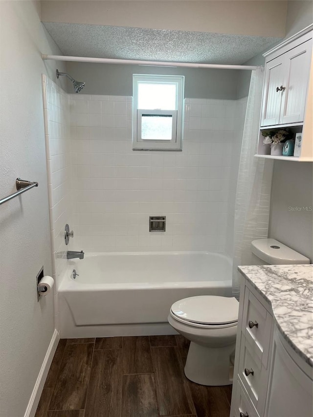 full bathroom featuring toilet, vanity, shower / bath combo, and wood finished floors