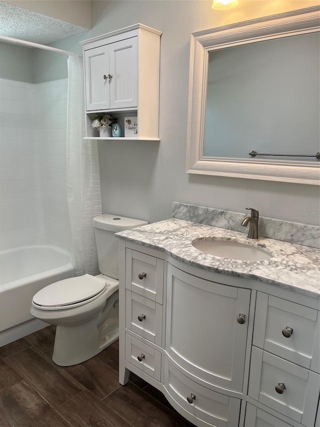 full bath with toilet, wood finished floors, vanity, and shower / bathtub combination with curtain