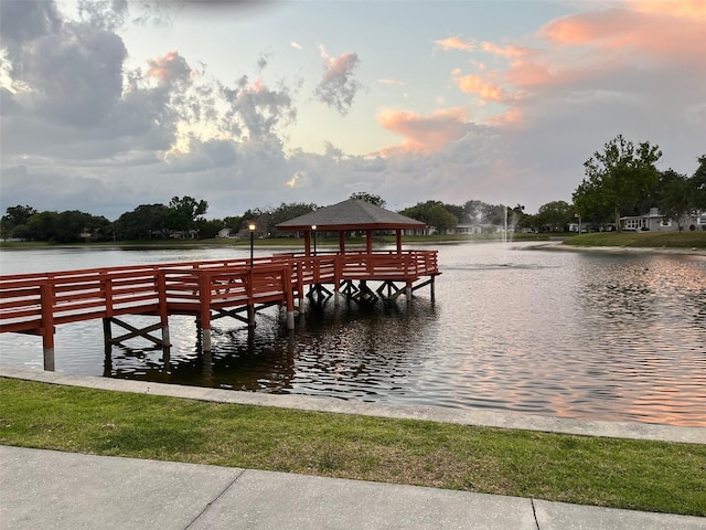 view of dock with a water view and a gazebo