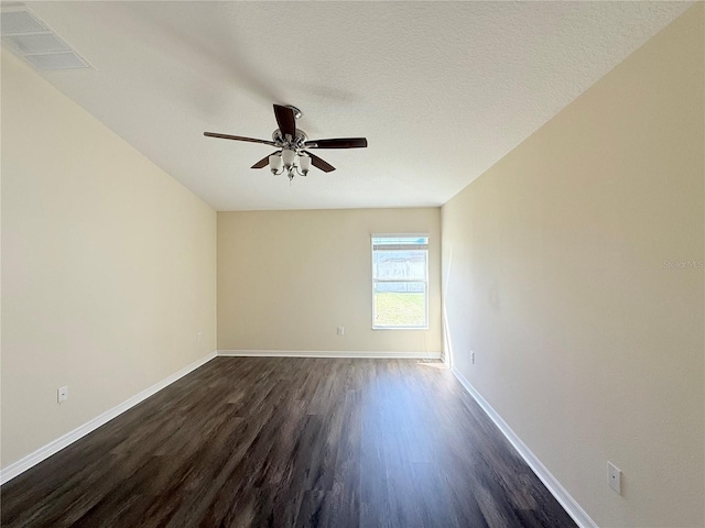 13181 Royal Pines Ave, Riverview, FL 33579 - empty room featuring dark wood-type flooring, baseboards, and a ceiling fan