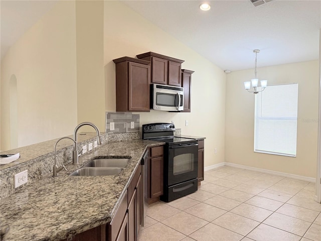 13181 Royal Pines Ave, Riverview, FL 33579 - kitchen featuring stainless steel microwave, black electric range oven, a sink, lofted ceiling, and a chandelier