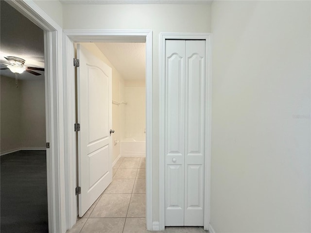 13181 Royal Pines Ave, Riverview, FL 33579 - hall featuring light tile patterned flooring and baseboards