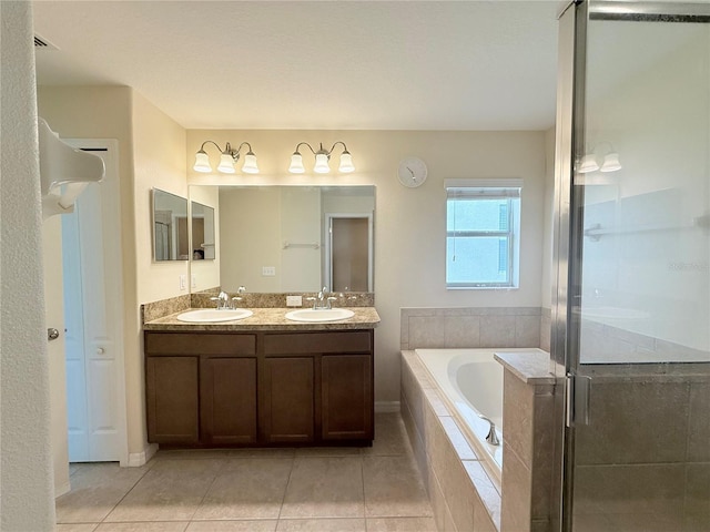 13181 Royal Pines Ave, Riverview, FL 33579 - full bath with a bath, double vanity, a shower stall, and tile patterned flooring