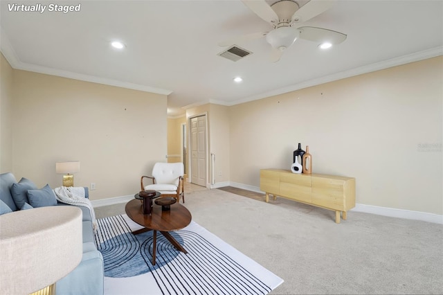 1515 12th Ct SE Unit 55, Largo, FL 33771 - carpeted living room with crown molding, baseboards, a ceiling fan, and recessed lighting