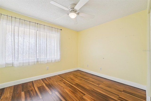 1515 12th Ct SE Unit 55, Largo, FL 33771 - unfurnished room featuring wood finished floors, baseboards, ceiling fan, and a textured ceiling
