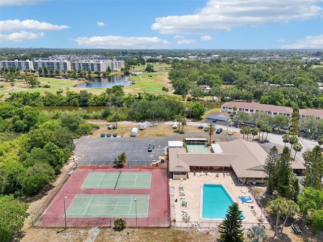 1515 12th Ct SE Unit 55, Largo, FL 33771 - drone / aerial view of a nearby body of water, a golf club, and a pool area